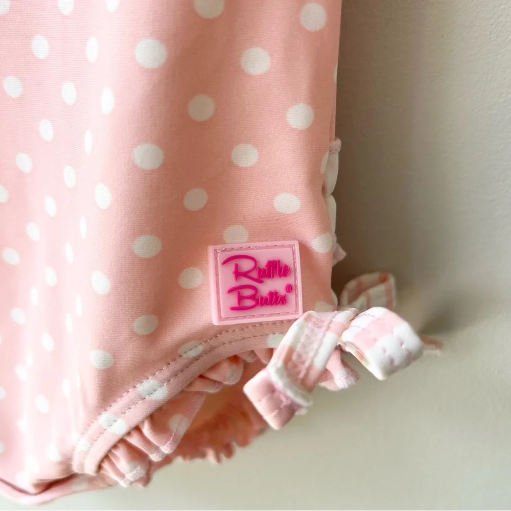 Rufflebutts polka dot long sleeve one piece rash guard baby girl